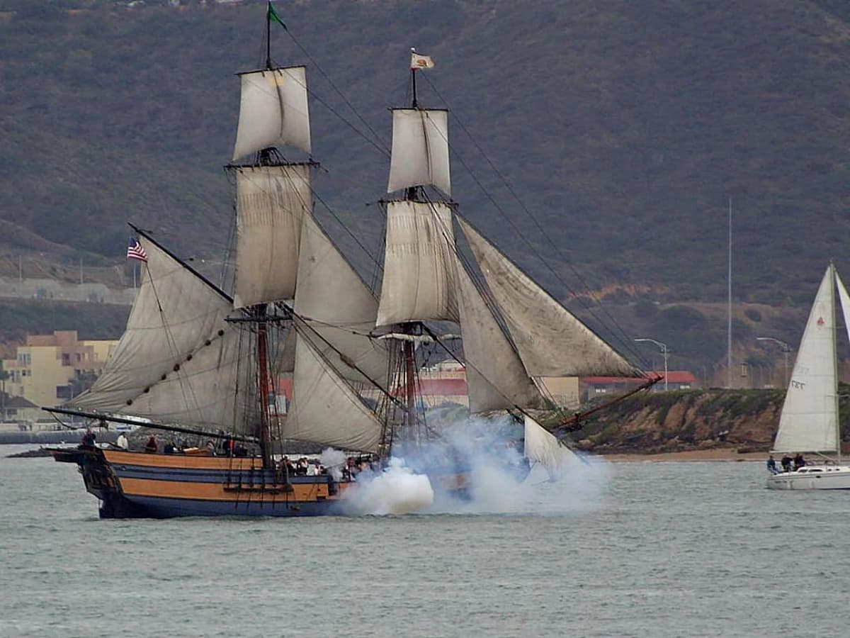 Historic vessels docked along the Embarcadero at the Maritime Museum of San Diego waterfront