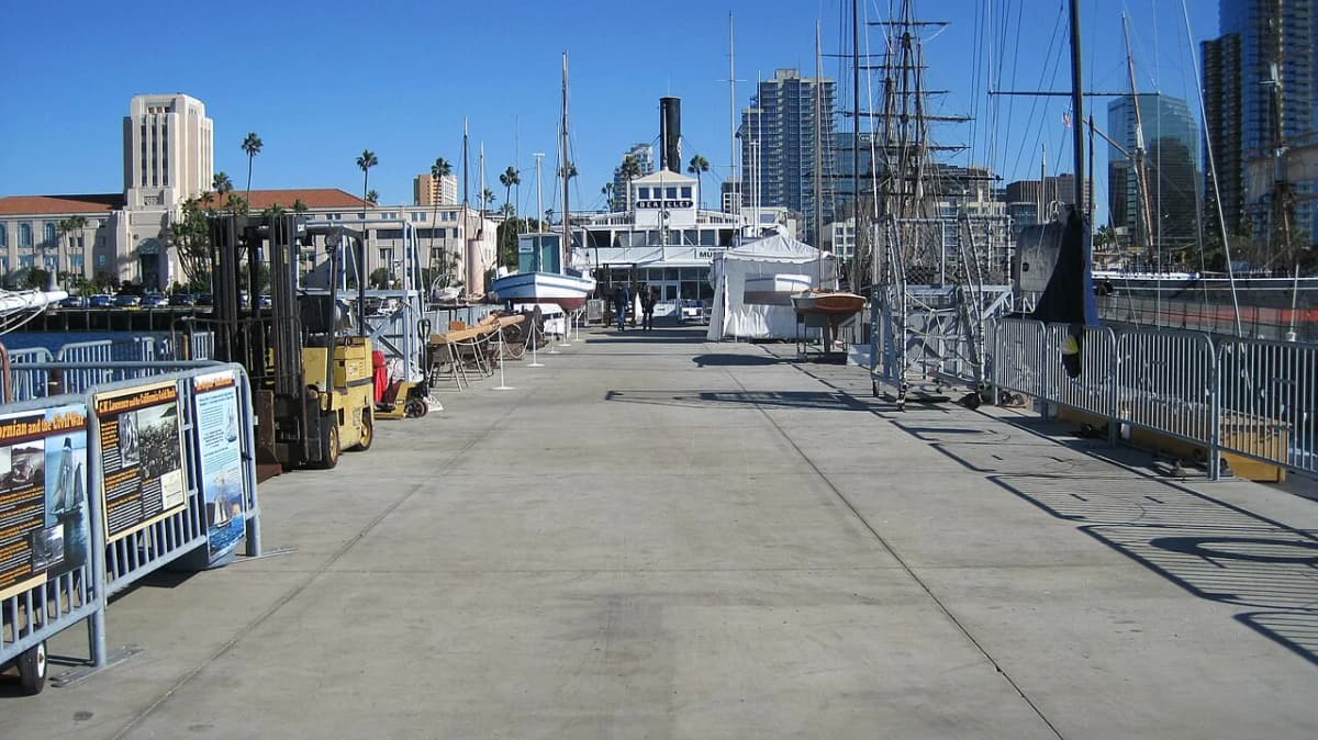 Visitors boarding the HMS Surprise replica frigate at the Maritime Museum of San Diego