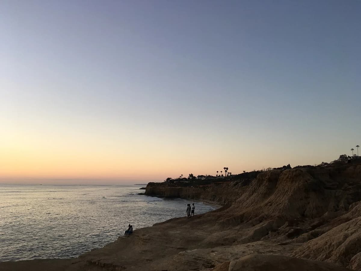 Tide pools at Sunset Cliffs Natural Park with sea urchins and anemones exposed at low tide